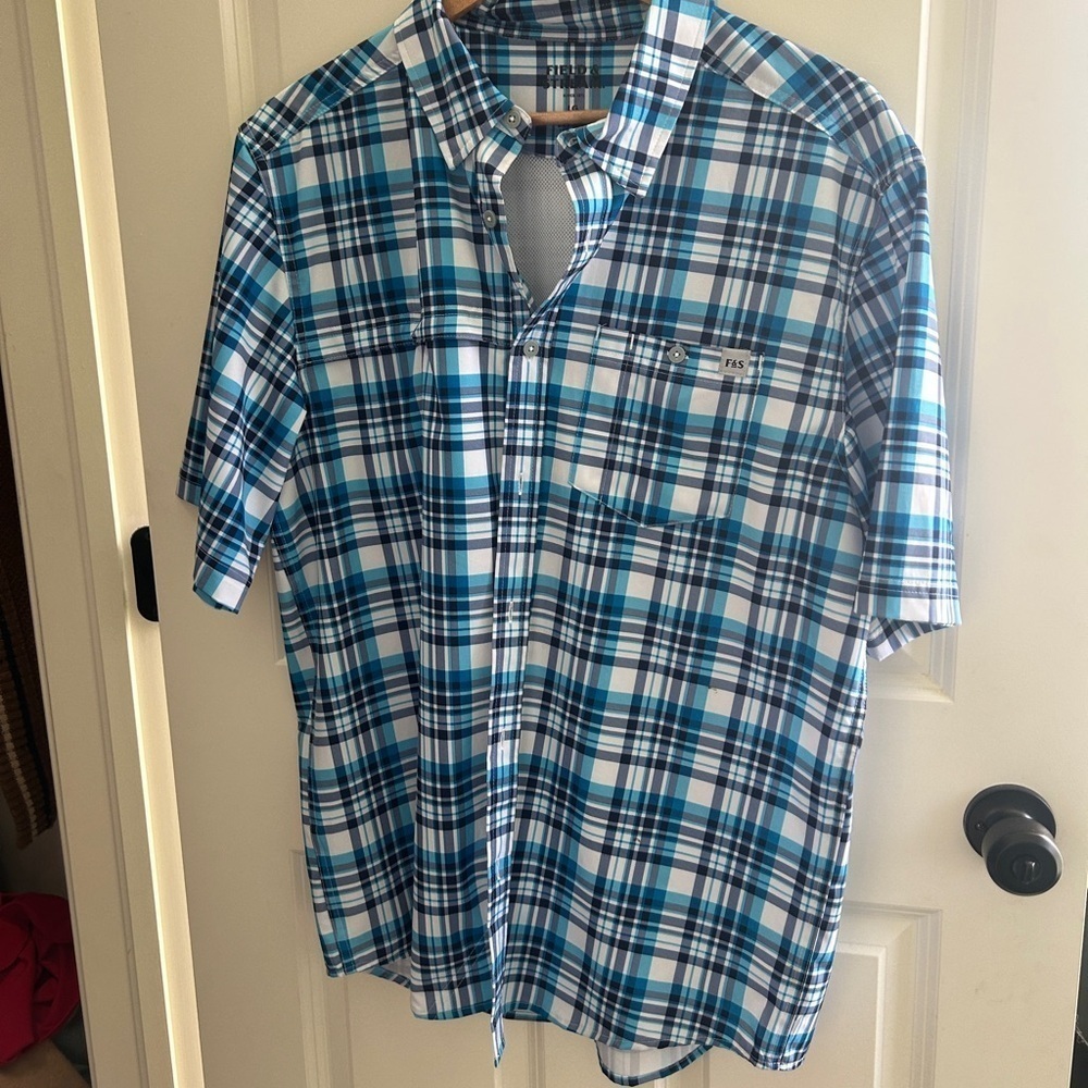 NWOT Field and Stream size Large blue plaid fishing shirt. Vented. Great colors!